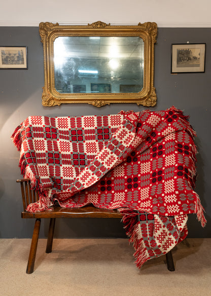 A pair of double sided traditional Welsh blankets