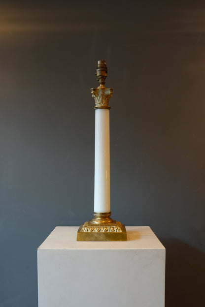 A large brass & opaline glass Corinthian column lamp.