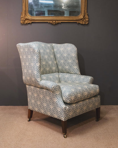 A Howard & Sons Wingback Armchair