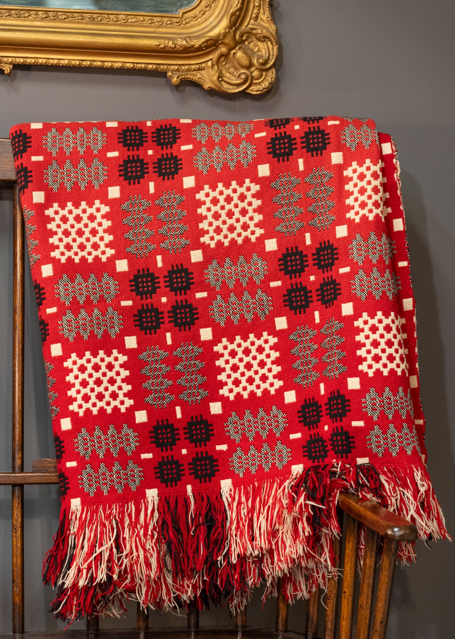 A pair of double sided traditional Welsh blankets