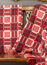 A pair of double sided traditional Welsh blankets