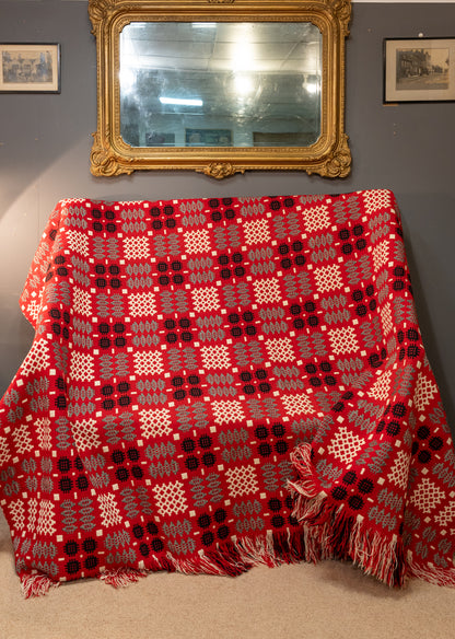 A pair of double sided traditional Welsh blankets