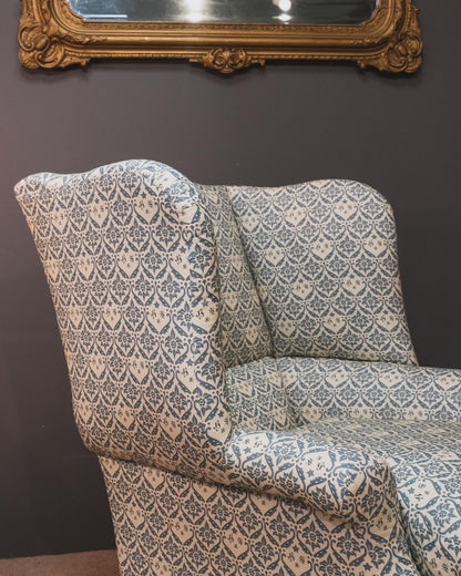 A Howard & Sons Wingback Armchair