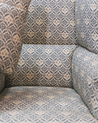 A Howard & Sons Wingback Armchair