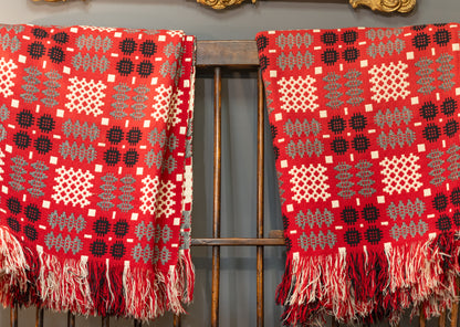 A pair of double sided traditional Welsh blankets