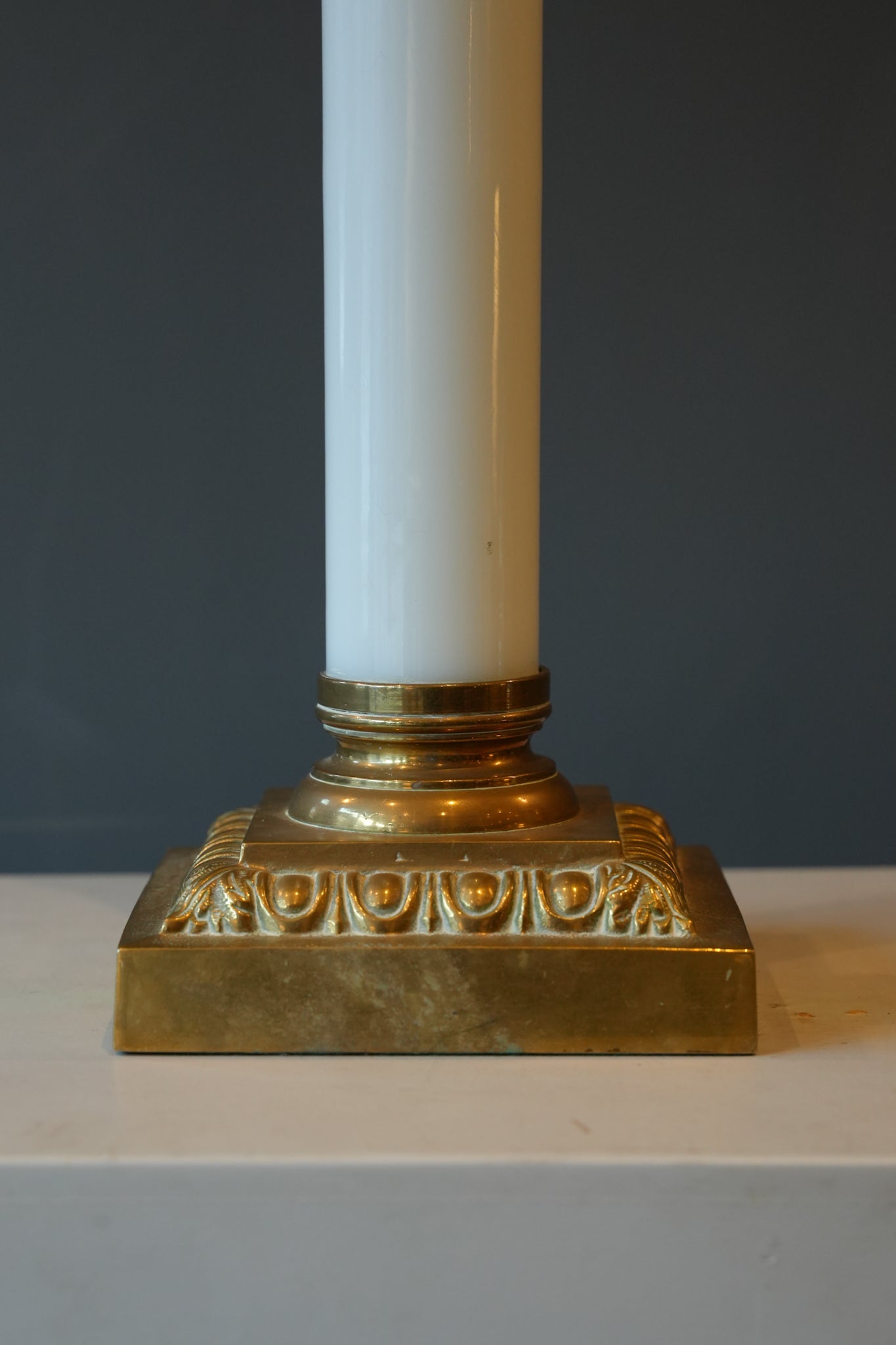 A large brass & opaline glass Corinthian column lamp.