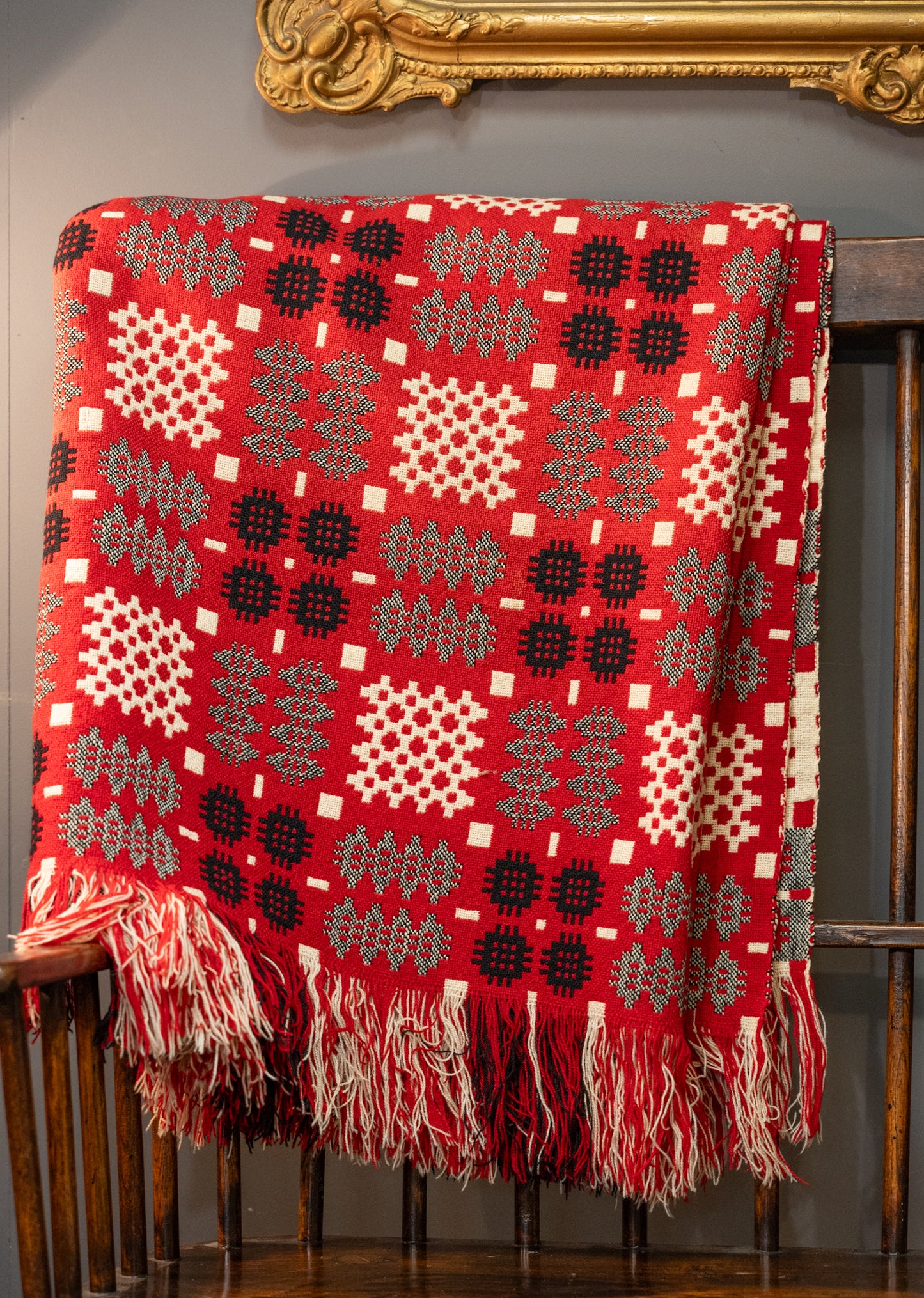 A pair of double sided traditional Welsh blankets