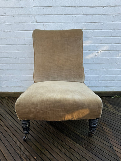 A late 19th century slipper chair