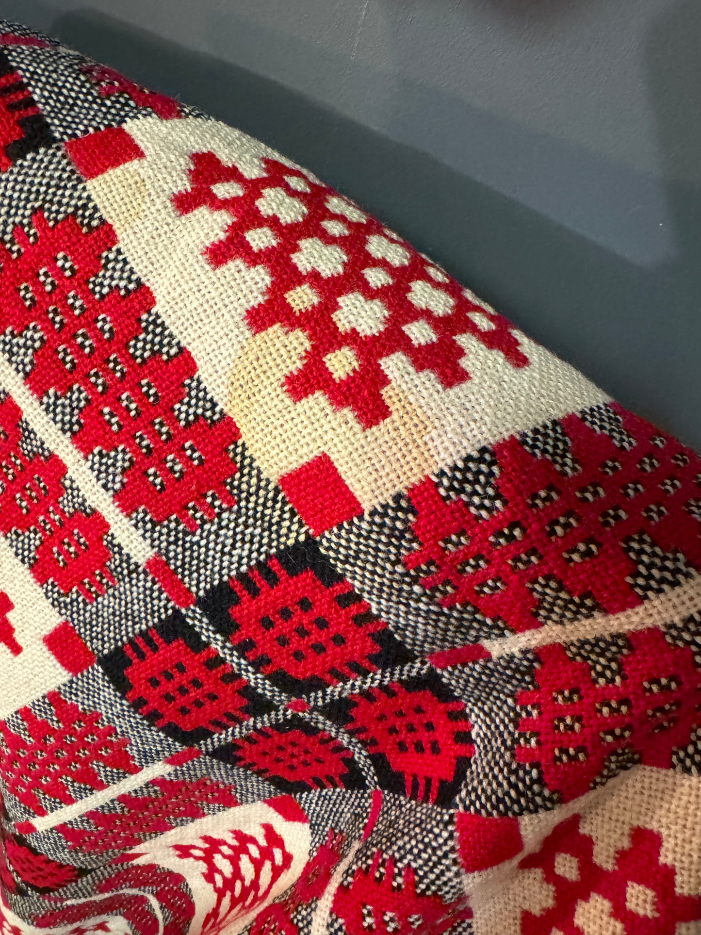 A pair of double sided traditional Welsh blankets